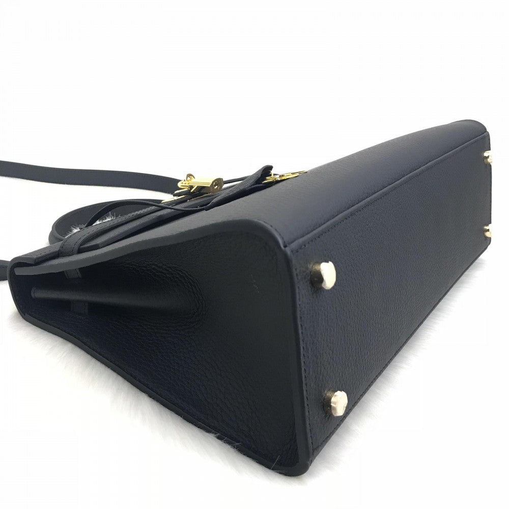 Kelly 32 | Togo-Leder | Palladium-Beschläge.